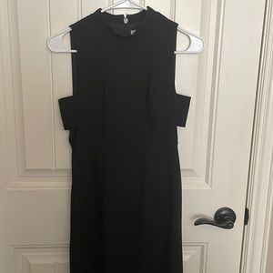 wore it once. Still new, long dress, see through from the knee down.